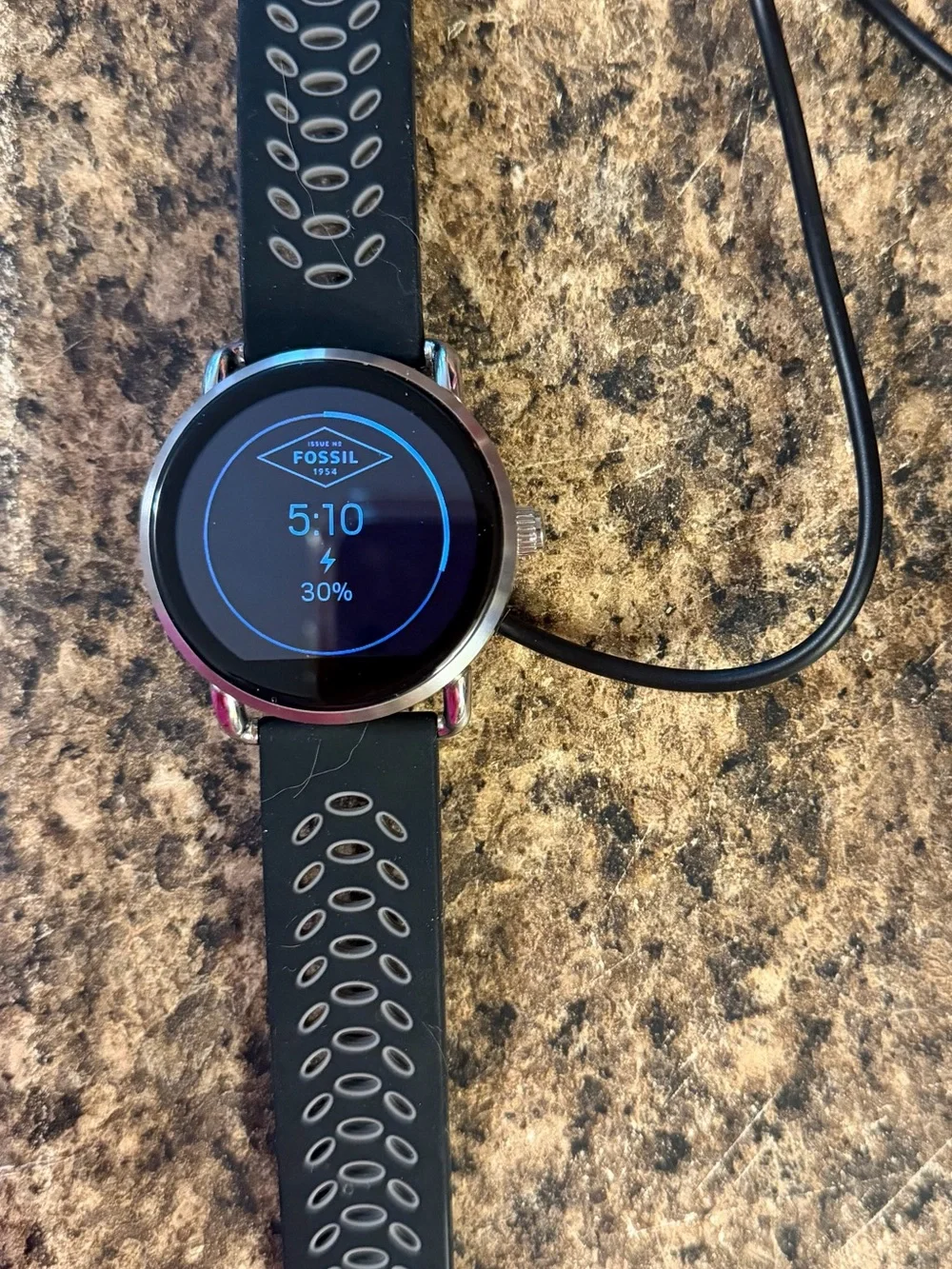 Fossil Q Wander Smartwatch with silicone and silver metal band and charger